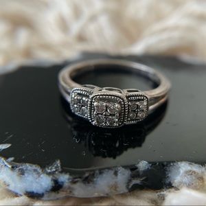 Small stone diamond ring. Size 7.